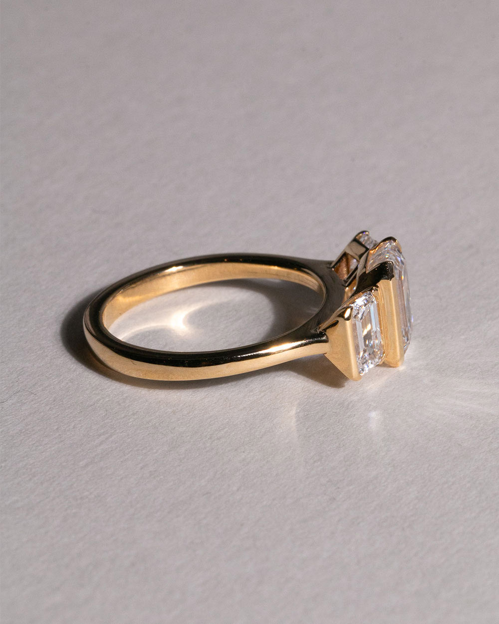 18ct Gold Emerald Cut Lab Grown Diamond Trilogy Ring side view