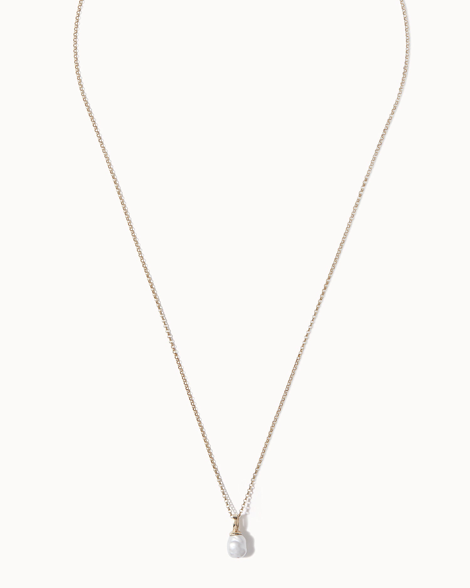 Solid gold and baroque pearl pendant necklace made in London by Maya Magal Jewellery