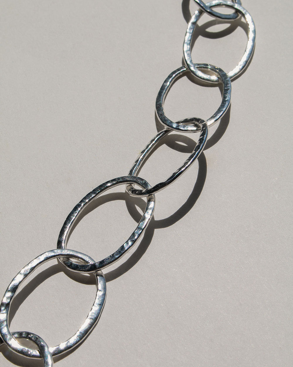 Close up photo of sterling silver Sculpt Heavy Chain Necklace on white background.