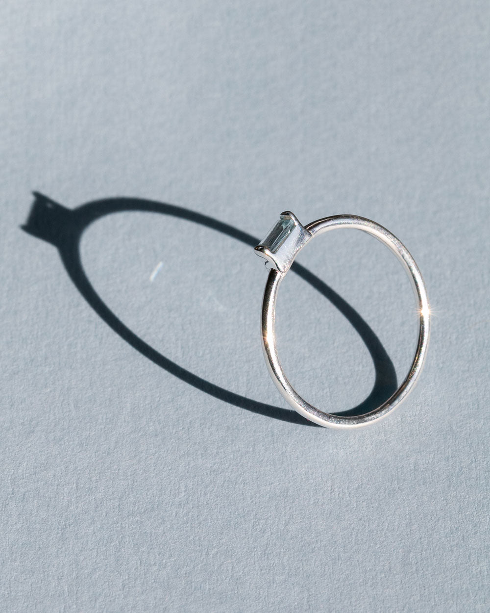 top side view of sterling silver March Aquamarine Birthstone Baguette Ring
