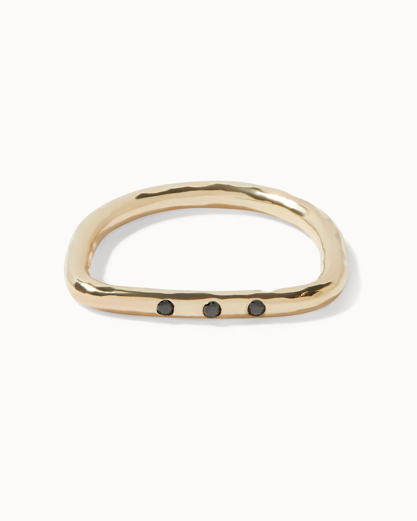 Recycled solid yellow gold flat top ring featuring three black diamonds handcrafted in London by Maya Magal London