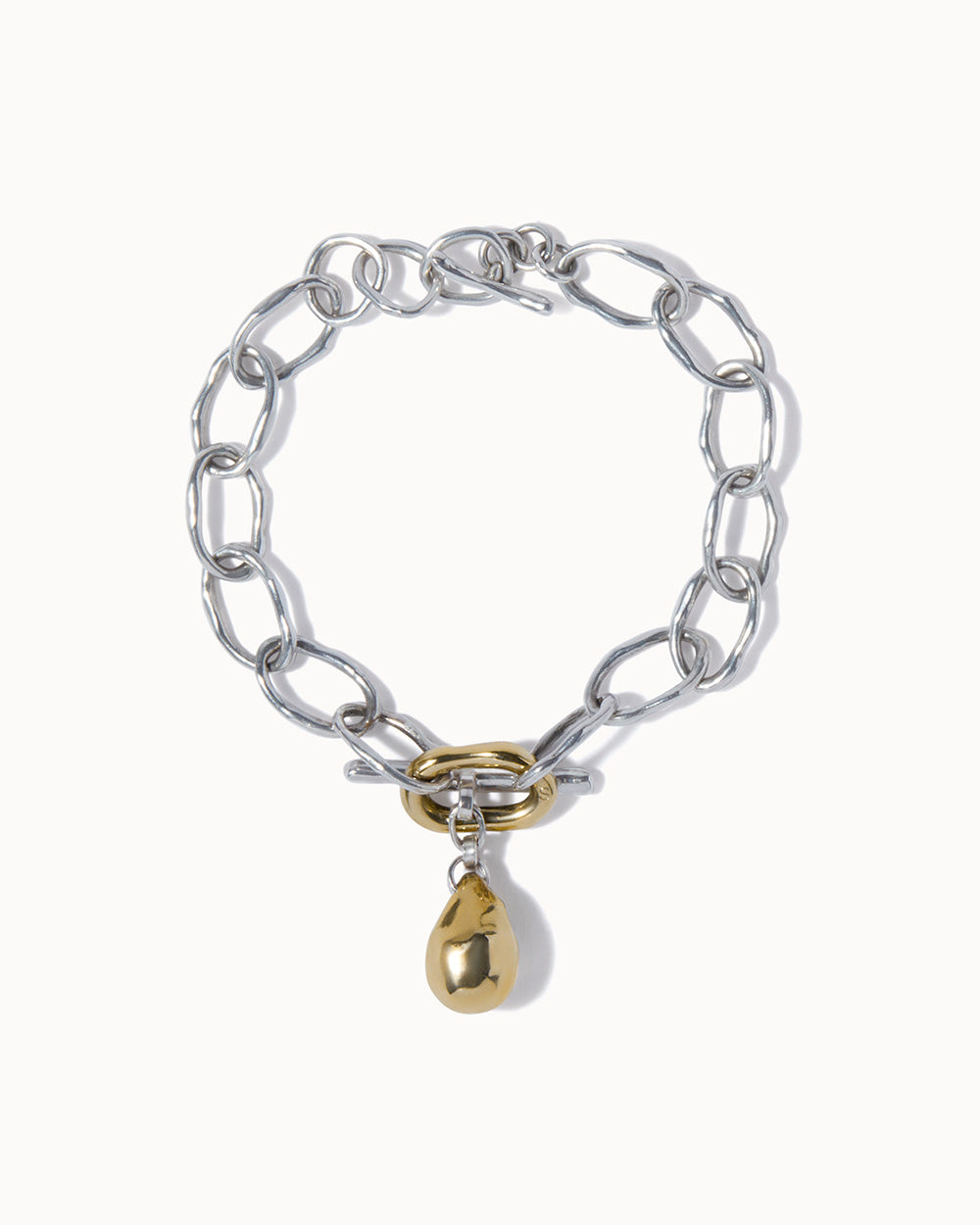 chain bracelet in recycled silver with solid gold link and charm handmade by maya magal jewellery