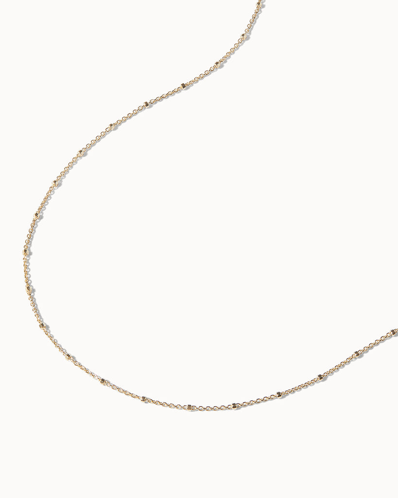 Trace and cube chain necklace in 18ct gold plate over sterling silver by Maya Magal Jewellery