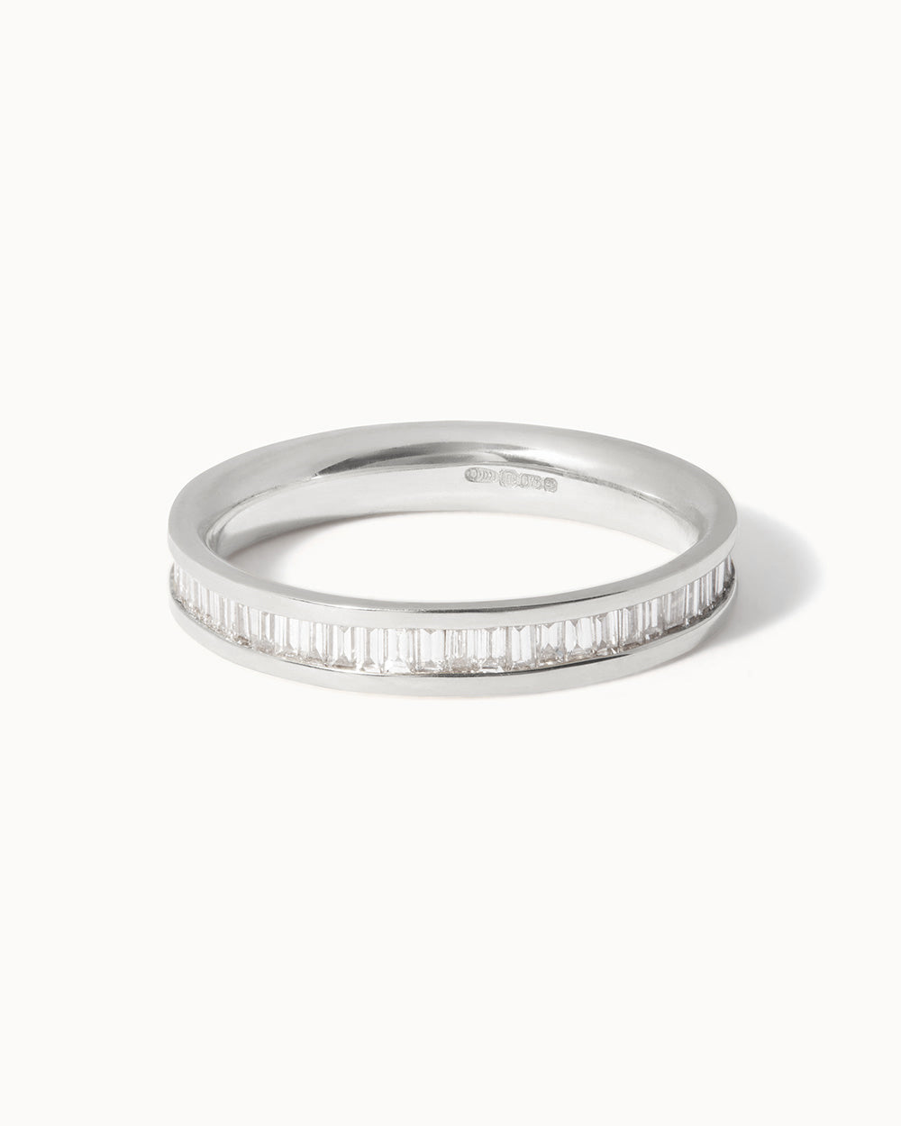 Platinum Baguette Diamond Channel Ring displayed on white background.