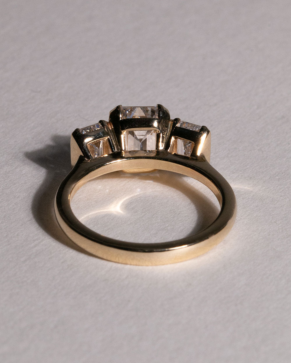 Back view of 9ct Gold 2.05ct Emerald Cut Lab Grown Diamond Trilogy Ring.