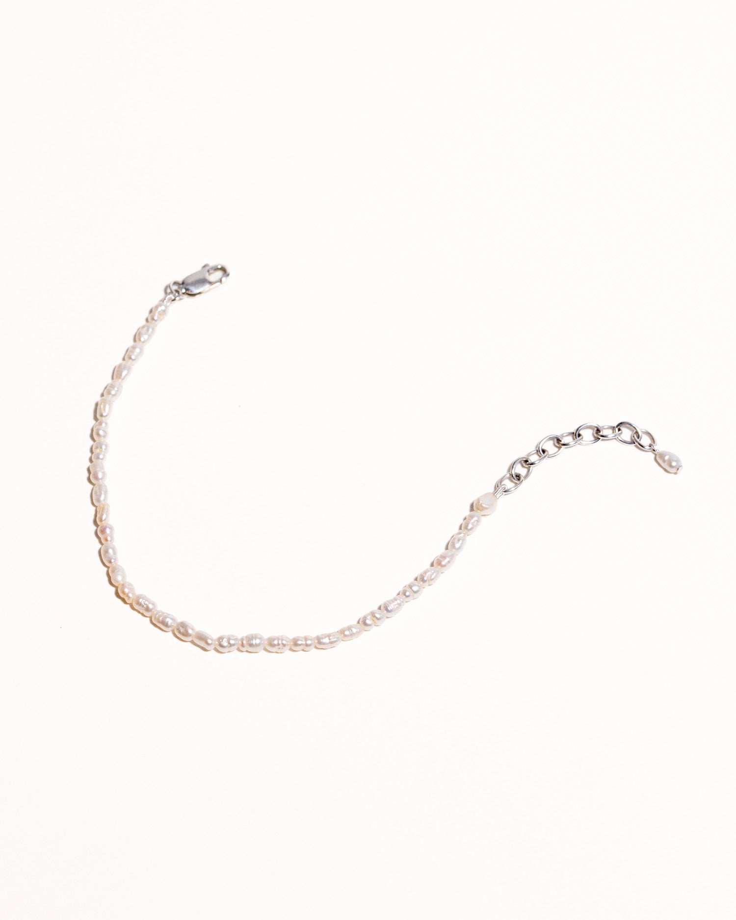 rice pearls beaded bracelet handstrung on silk thread handcrafted in London with 925 sterling silver by Maya Magal London