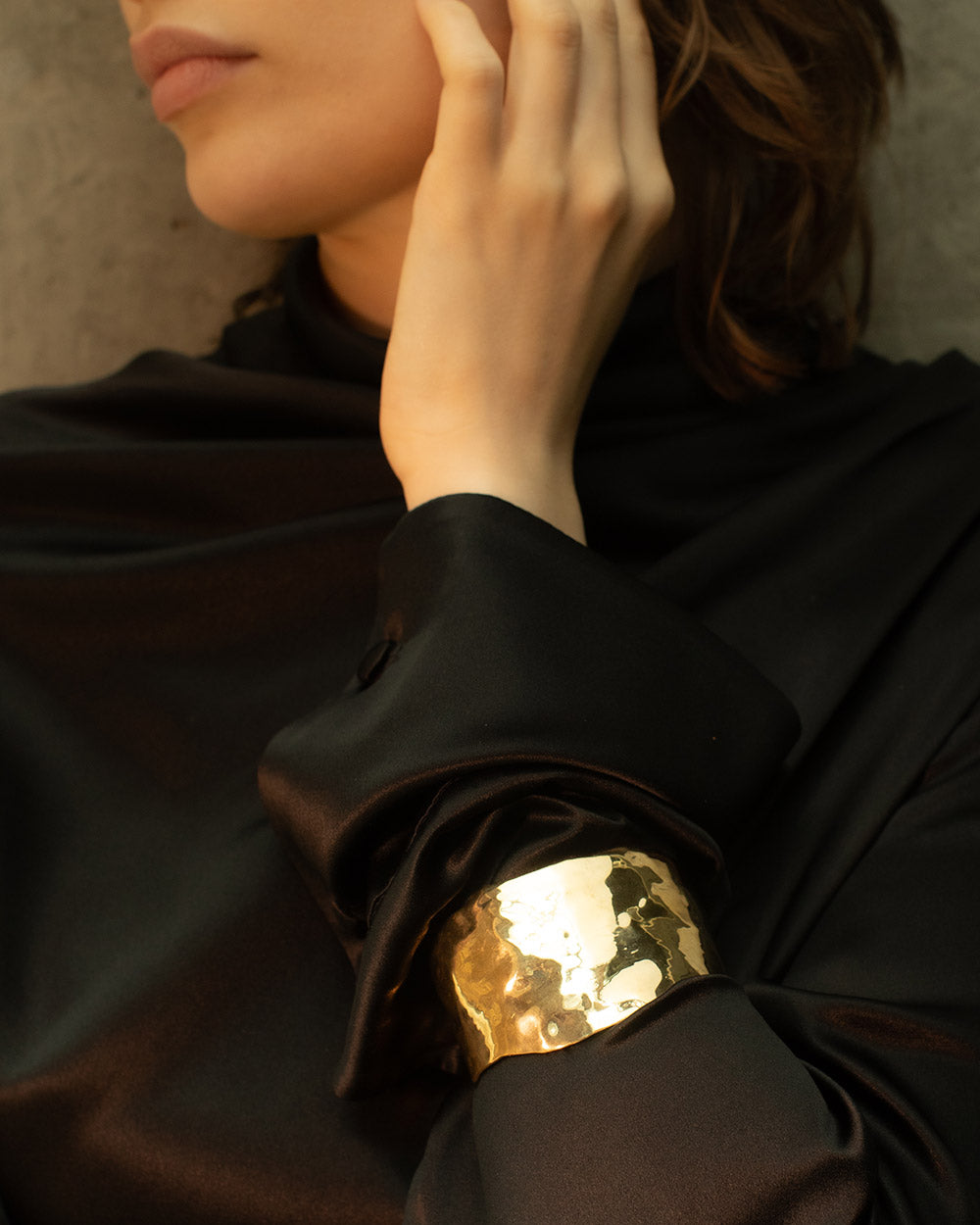 Front view of model wearing maya magal statement cuff modern and striking.