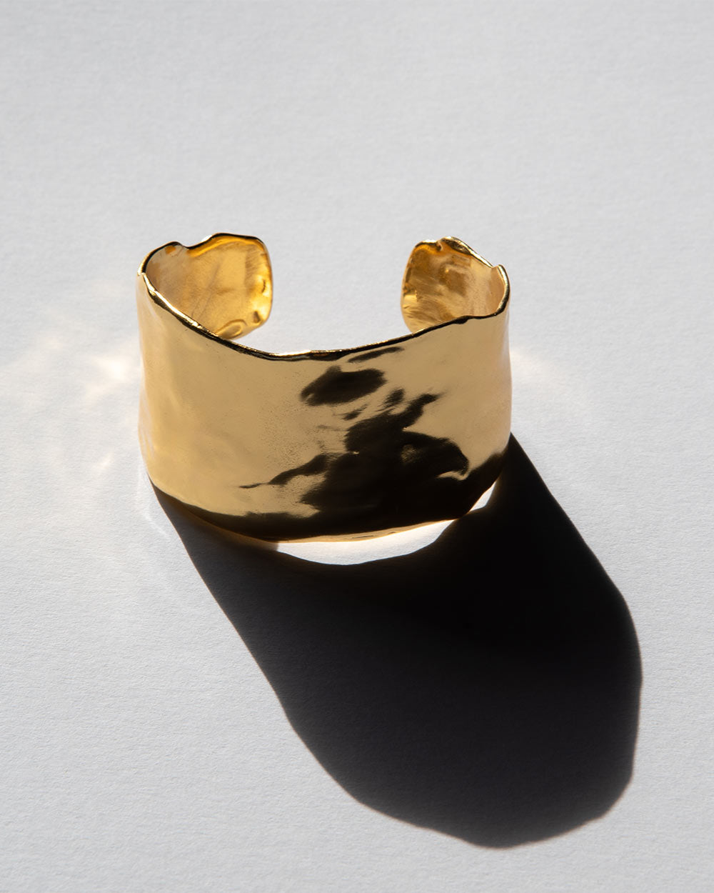 18 Ct gold plated brass MM STUDIO Molten Cuff front view.