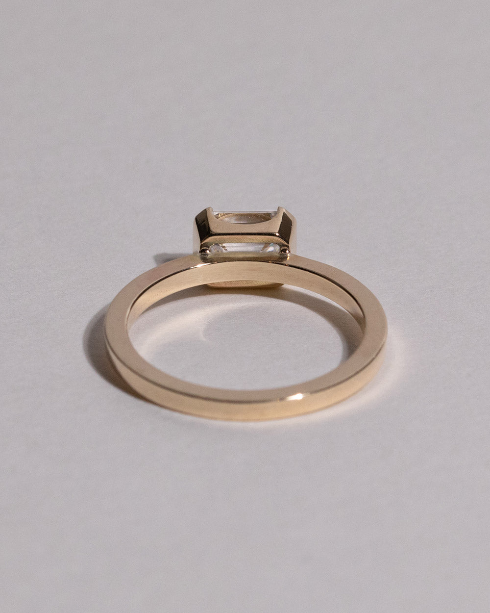 Back view of 9ct Gold Emerald Cut 1ct Lab Grown Diamond Ring on white background.