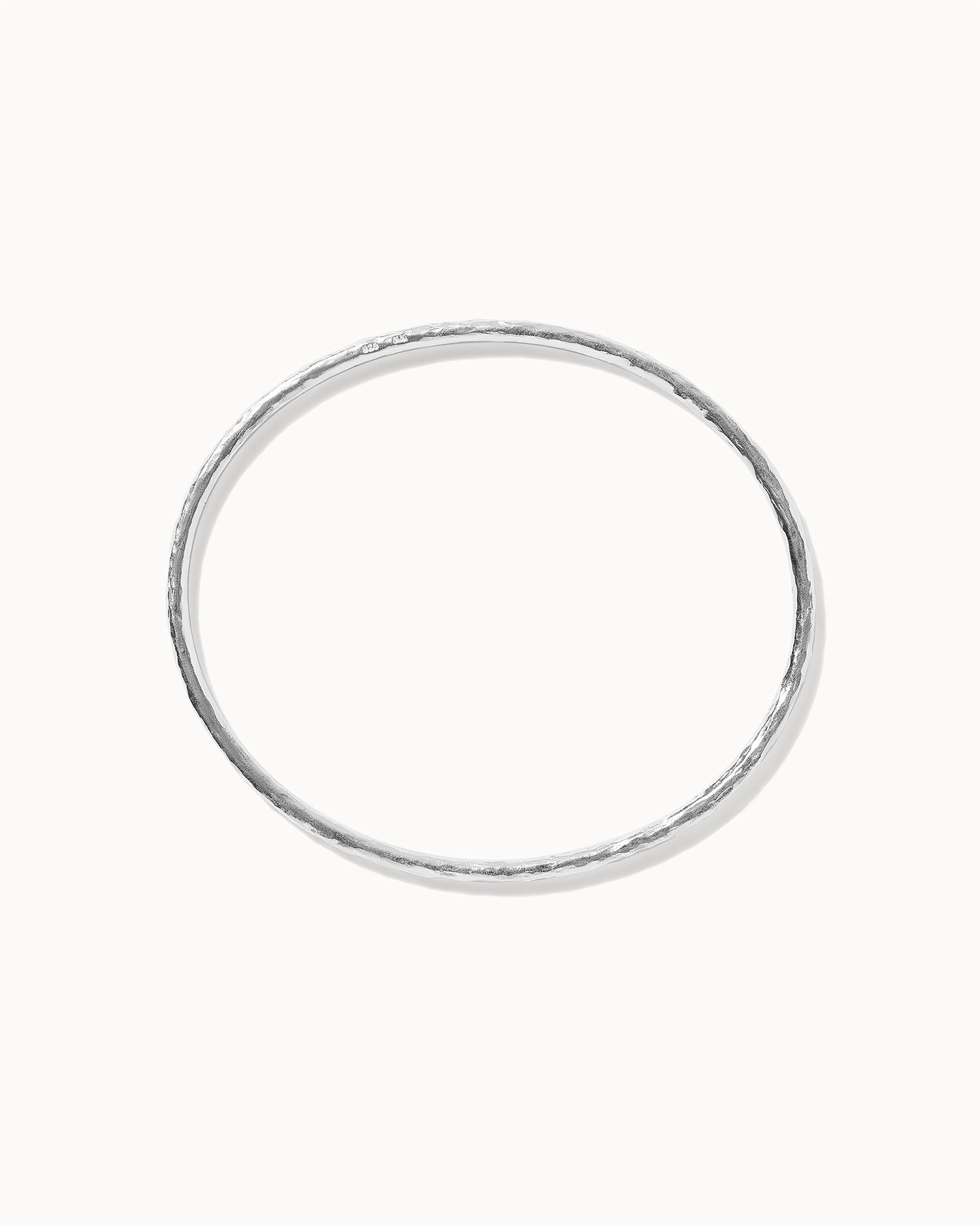 sterling silver bangle with hammered texture handcrafted in London by Maya Magal London