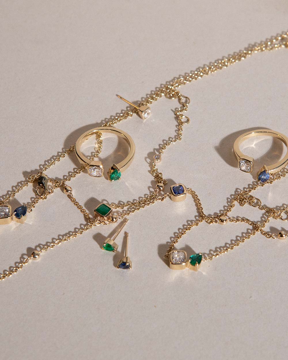 toi et moi ring with 0.36ct lab grown diamond and pear cut sapphire handcrafted in London by Maya Magal London