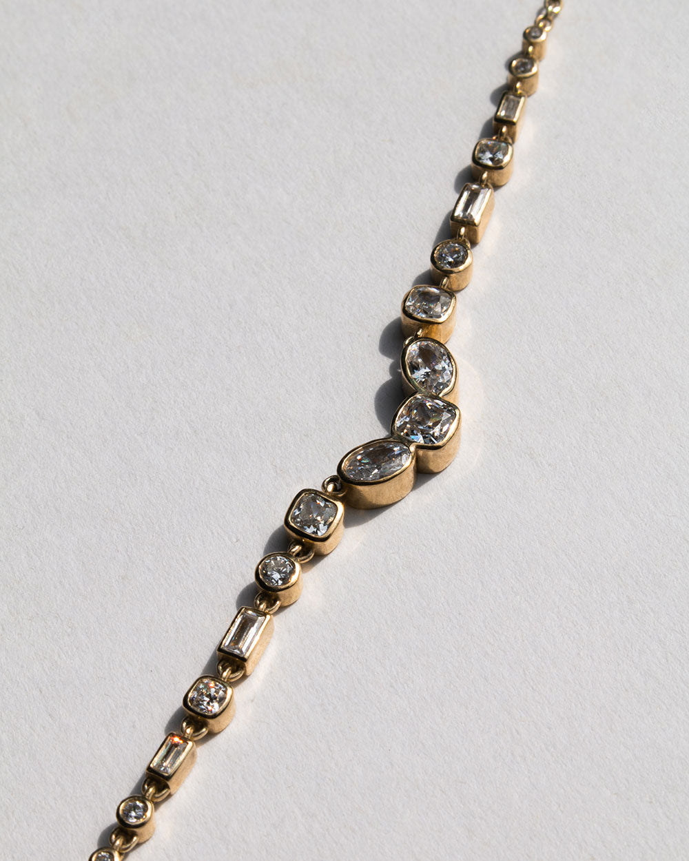 Up close of Vega Diamond Necklace on white background.