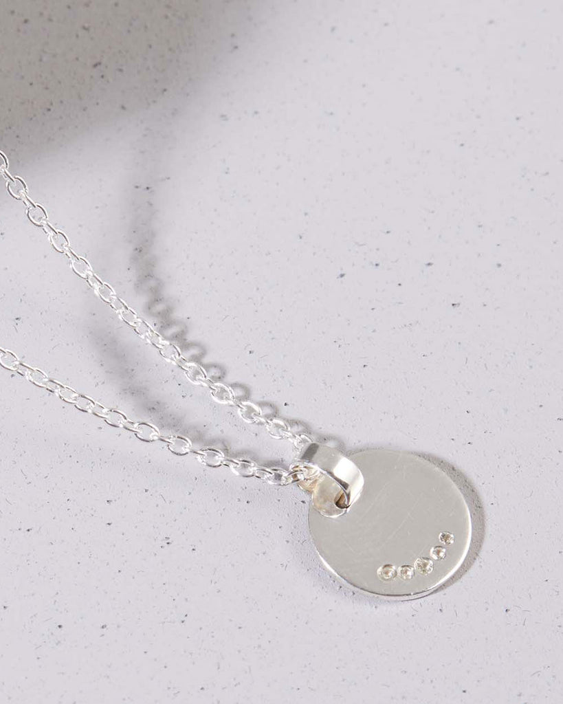 925 Recycled Sterling Silver Engravable Round Charm Necklace with White Topaz Stones handmade in London by Maya Magal sustainable jewellery brand