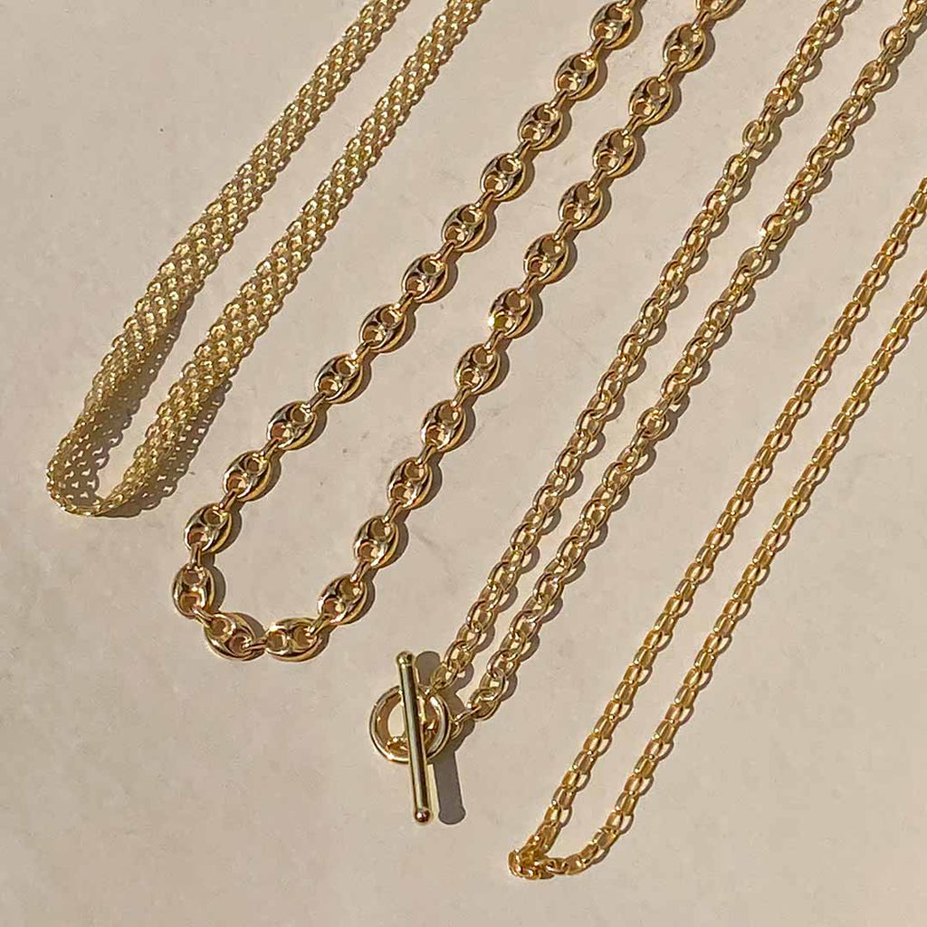 Layering Chains: A Guide to Building the Perfect Necklace Stack