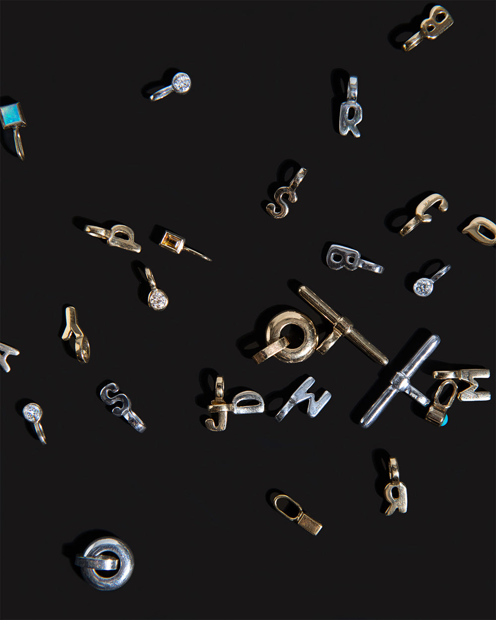 Recycled 9ct solid gold and 925 sterling silver charms handmade in London by Maya Magal London