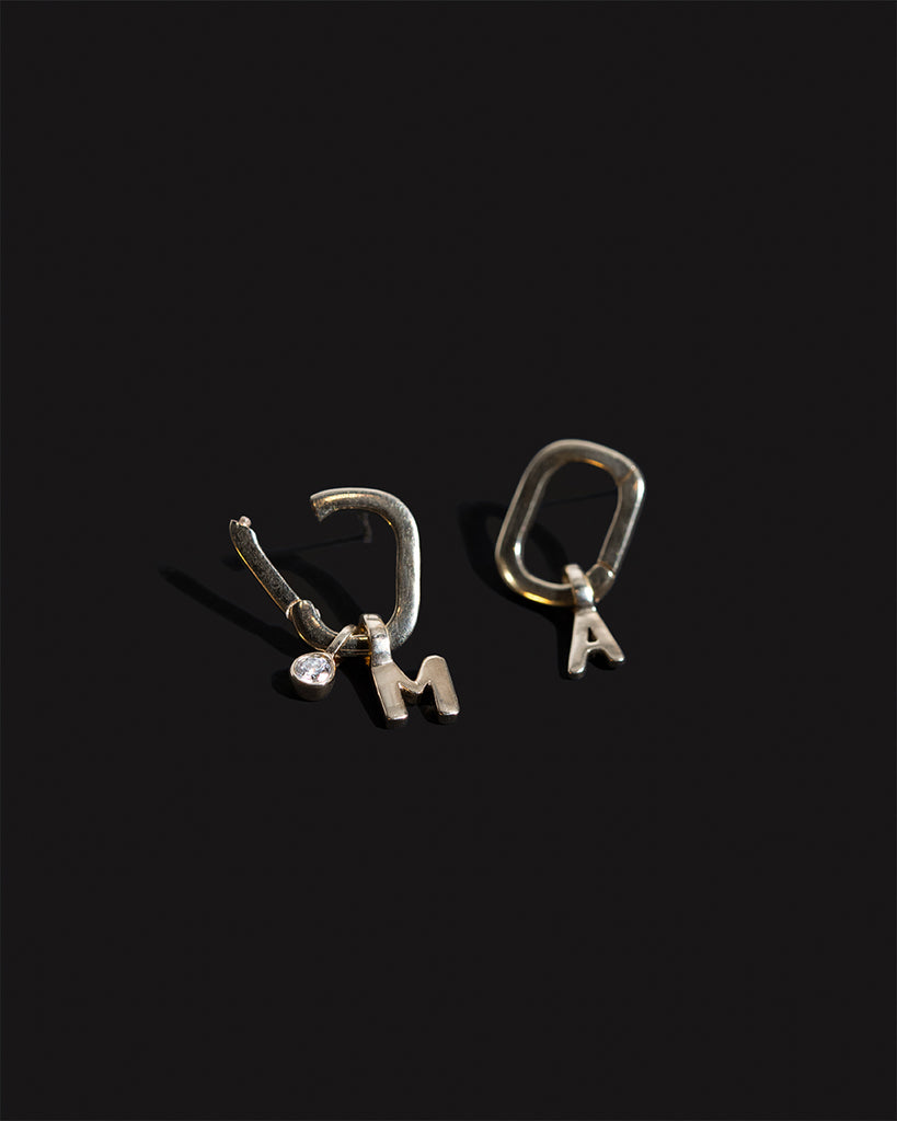 Recycled 9ct solid gold hoop earrings with initial charms and lab grown diamond charm handmade in London by Maya Magal London