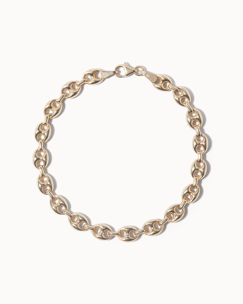 A classic anchor or Gucci chain bracelet made in recycled 9ct solid gold by maya magal jewellery