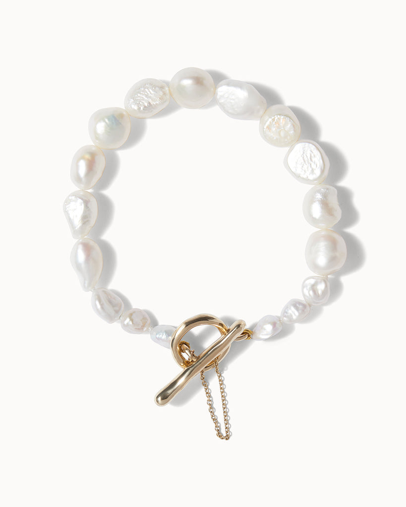 Baroque Pearl T-Bar bracelet handcrafted with solid gold in London by Maya Magal Jewellery