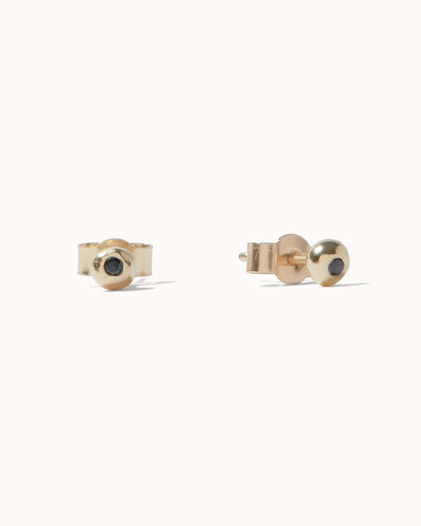 Recycled solid yellow gold stud earrings with black diamonds handcrafted in London by Maya Magal London