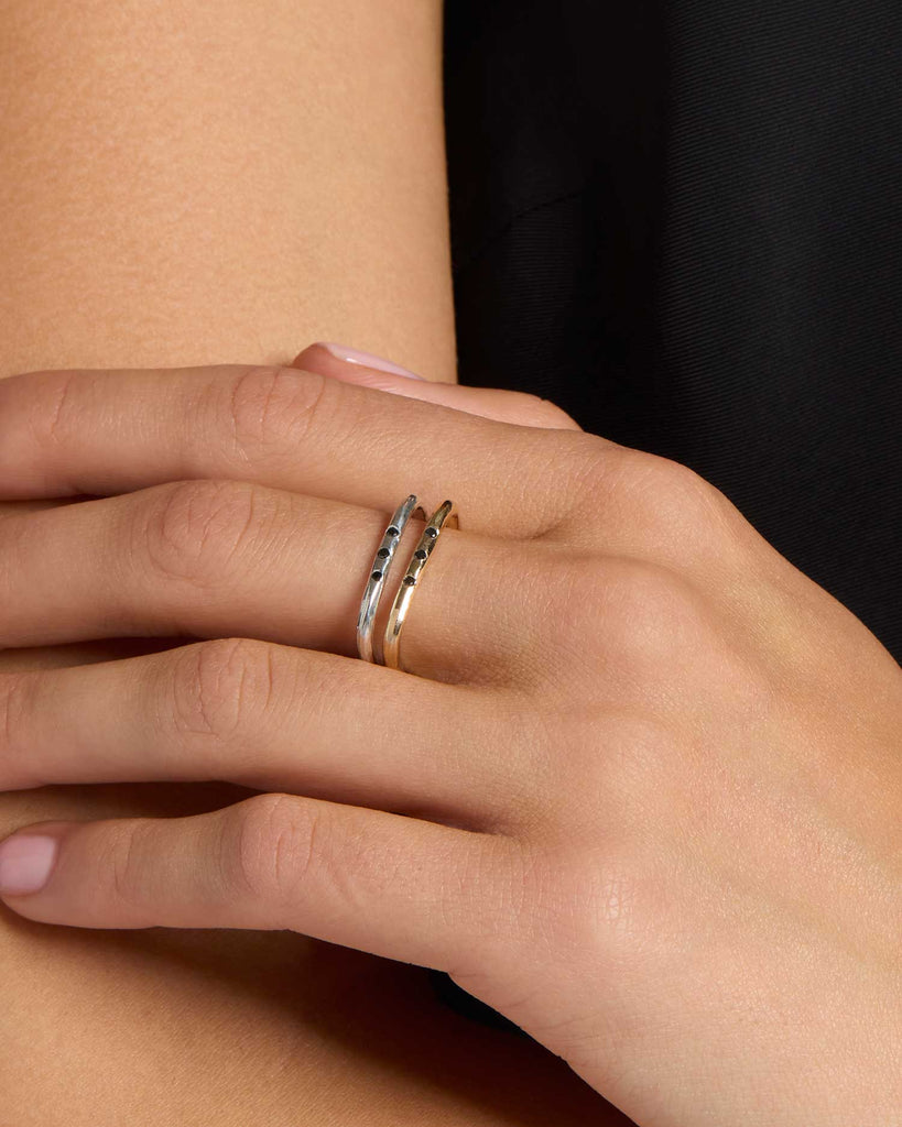 Recycled solid white gold flat top ring featuring three black diamonds handcrafted in London by Maya Magal London