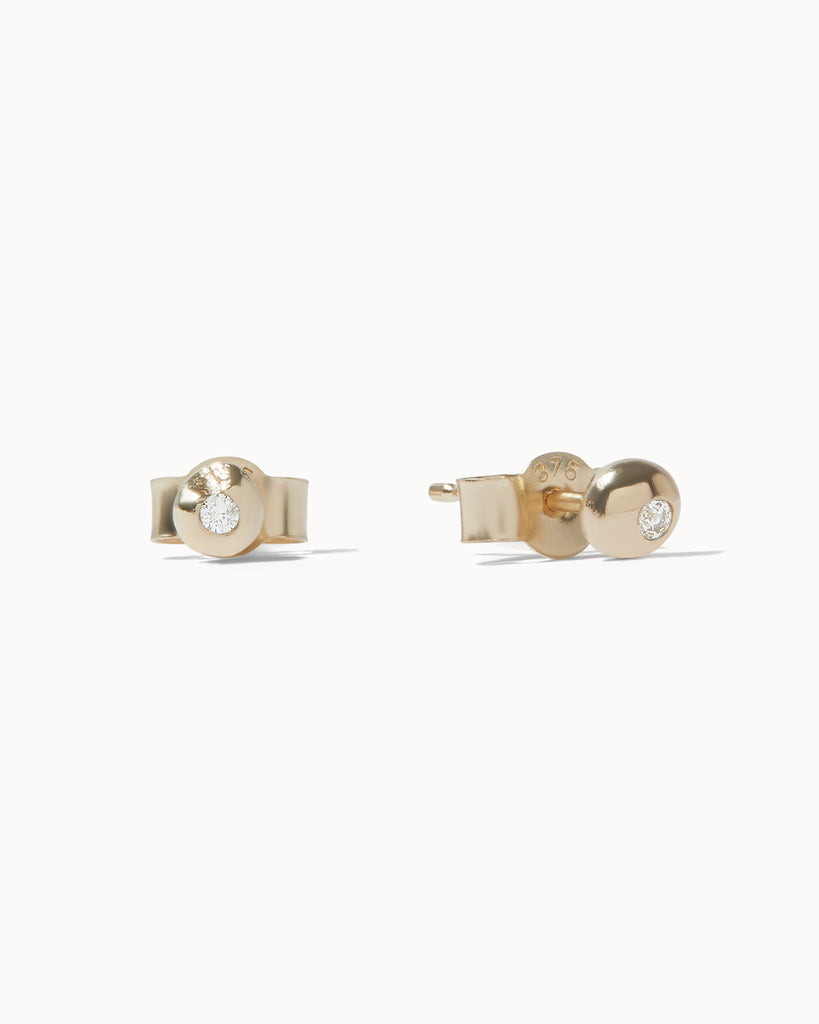 Recycled solid yellow gold stud earrings with white diamonds handcrafted in London by Maya Magal London