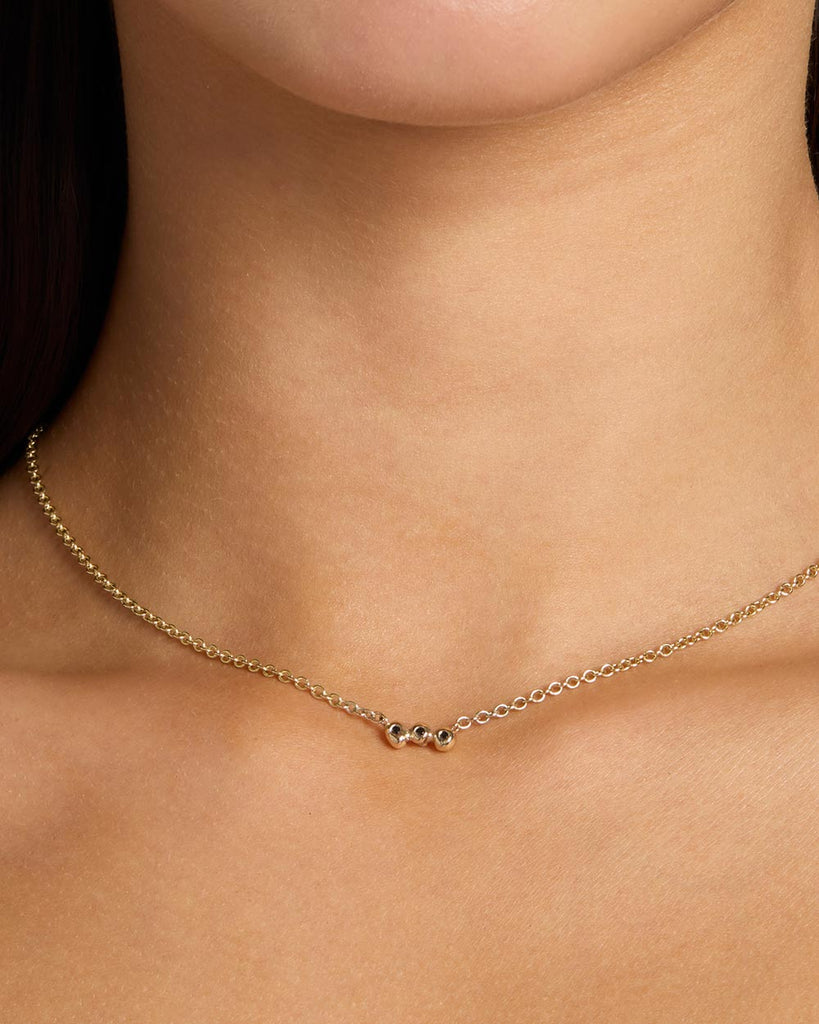 Recycled solid yellow gold chain necklace featuring three black diamonds in bezel setting handcrafted in London by Maya Magal London