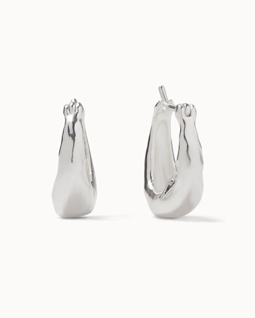 Chunky silver hoop earrings handmade sustainably by maya magal jewellers in london