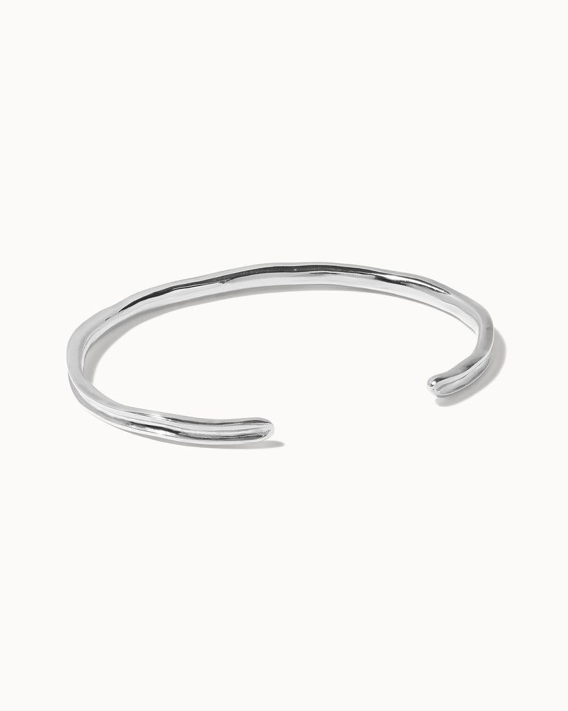 Recycled sterling silver adjustable concave bangle handcrafted in London by Maya Magal London
