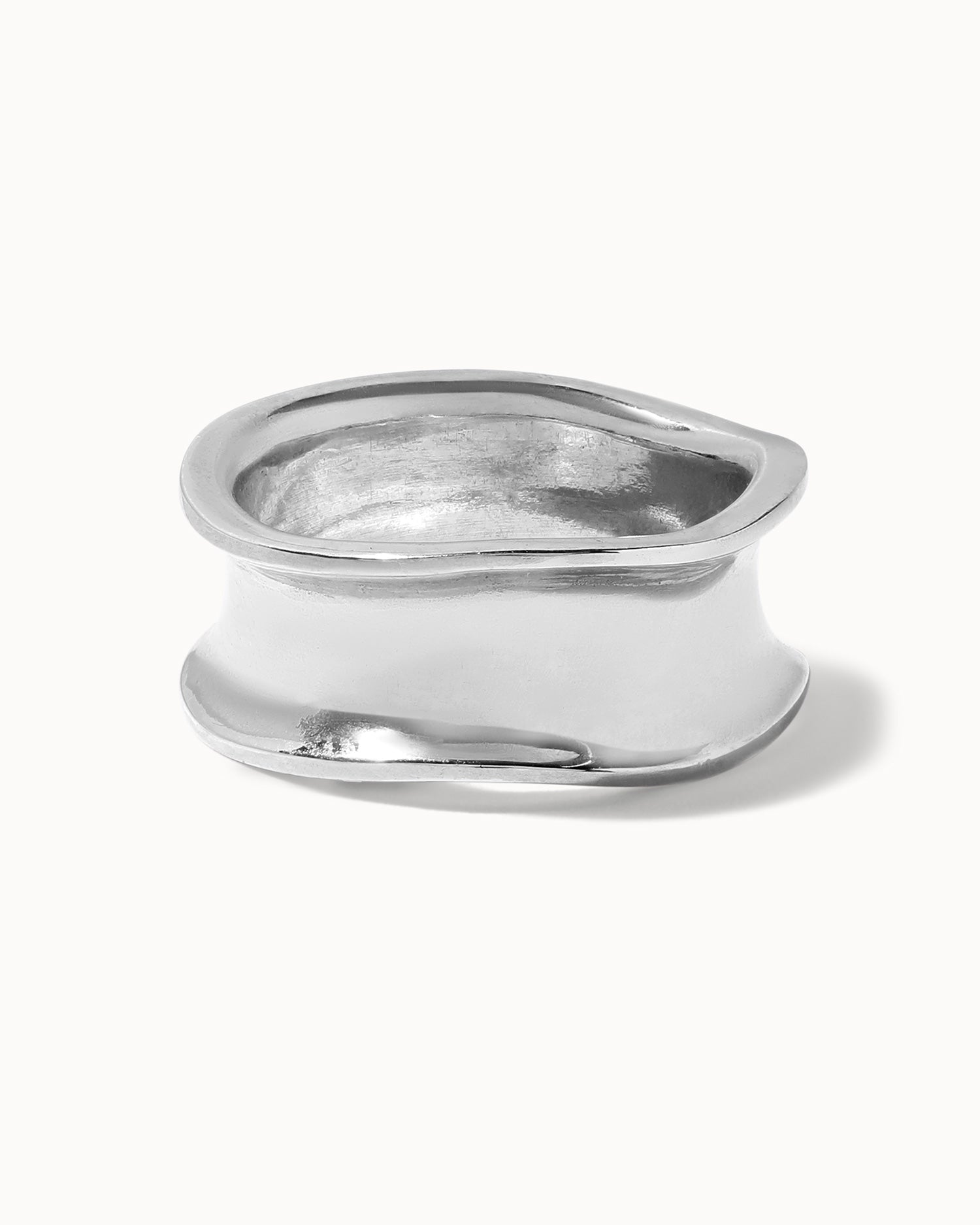 Recycled sterling silver concave wide band statement ring handcrafted in London by Maya Magal London