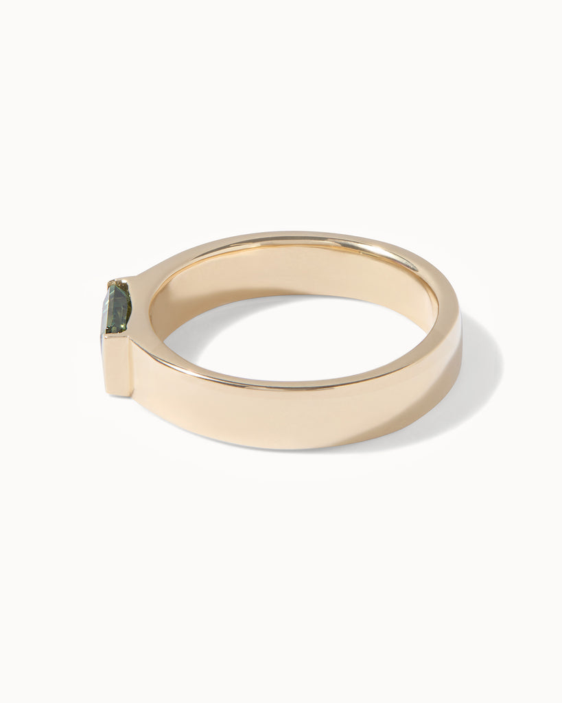 9ct solid gold ring featuring an emerald cut green sapphire handcrafted in London by Maya Magal London