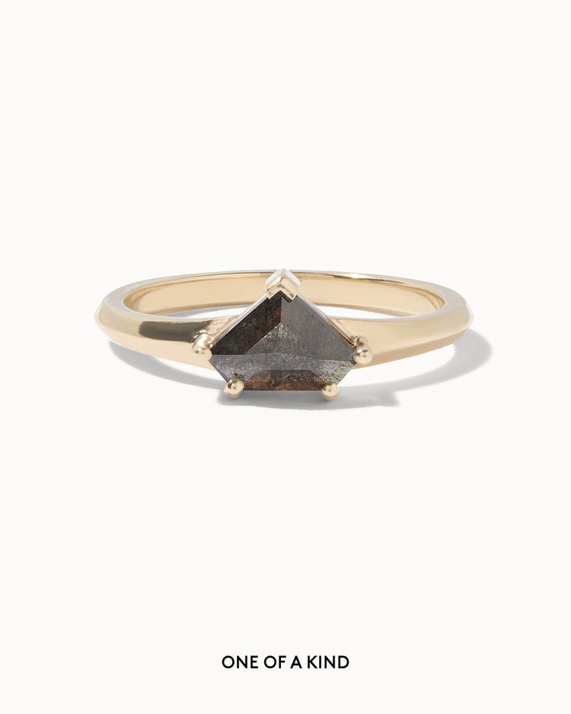 solid gold engagement ring featuring a shield cut grey diamond handcrafted in London by Maya Magal London