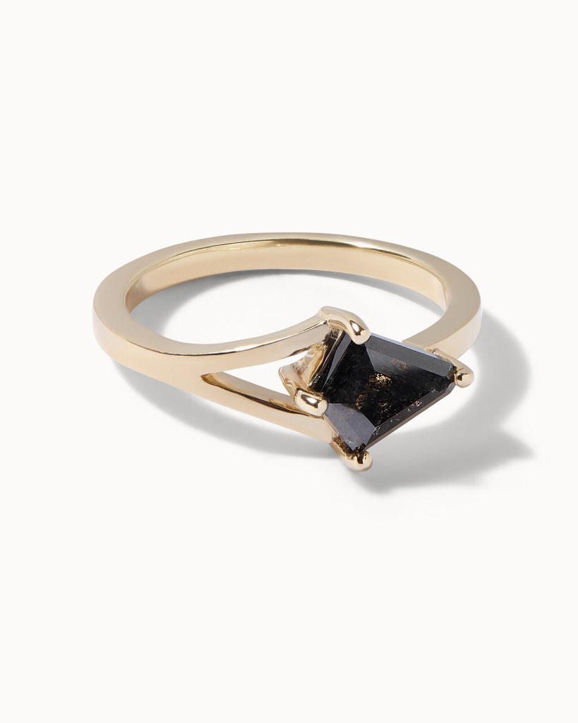 solid gold engagement ring featuring a kite cut grey diamond, set east-to-west on an asymmetrical split band handcrafted in London by Maya Magal London