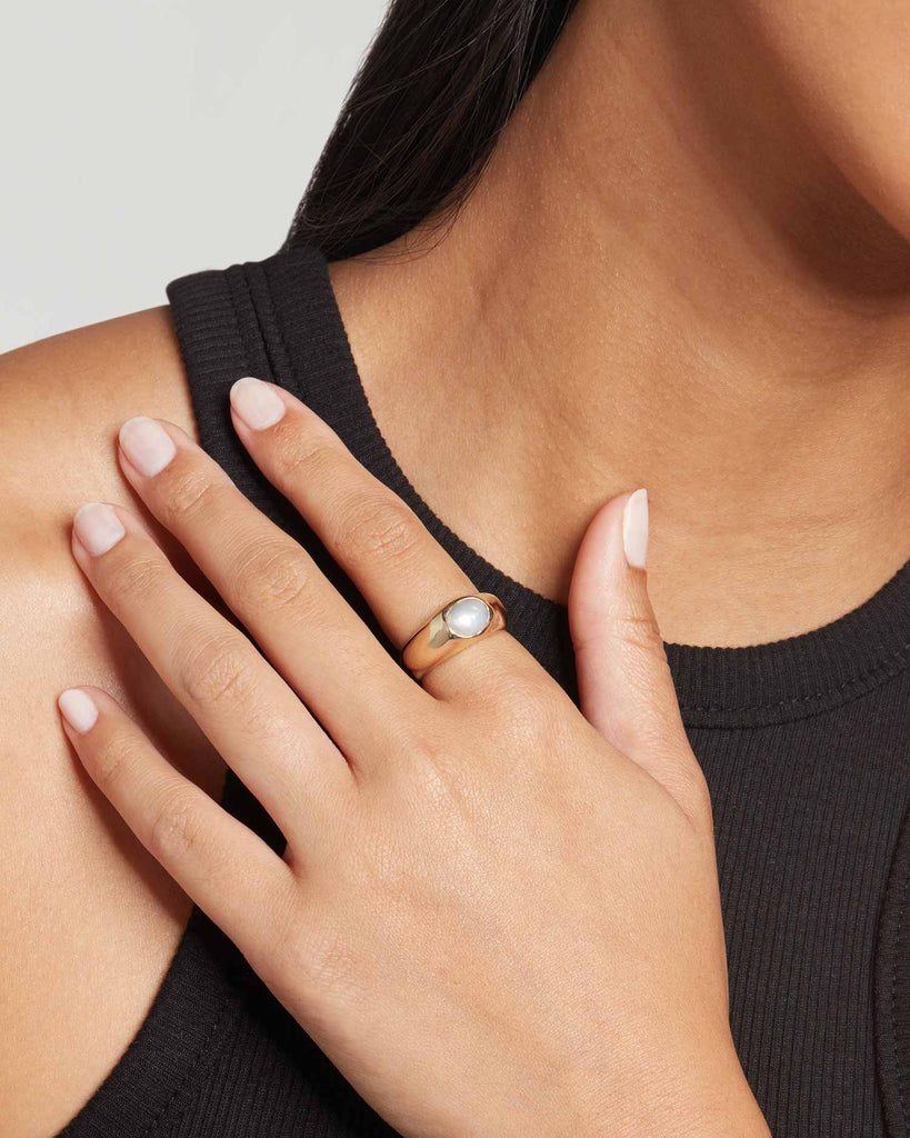 Bold solid gold signet ring featuring a baroque pearl handcrafted by Maya Magal Jewellery in London