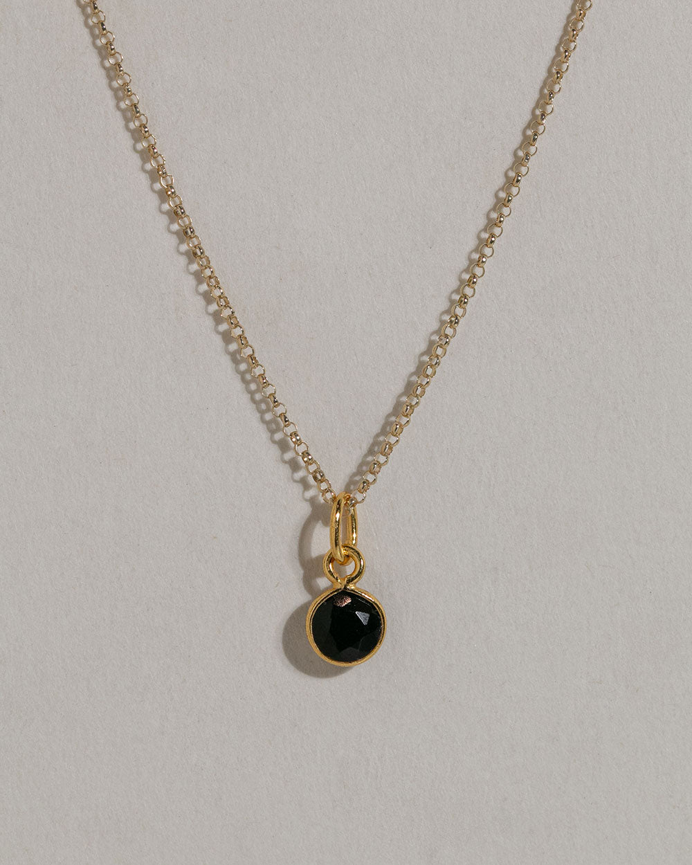 Black Spinel Charm