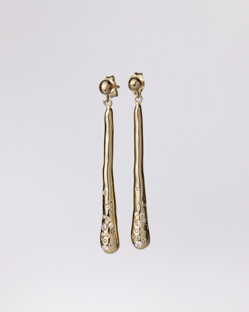 hand-carved recycled 9ct solid yellow gold drop earrings with finely set white and champagne natural diamonds handcrafted in London by Maya Magal London