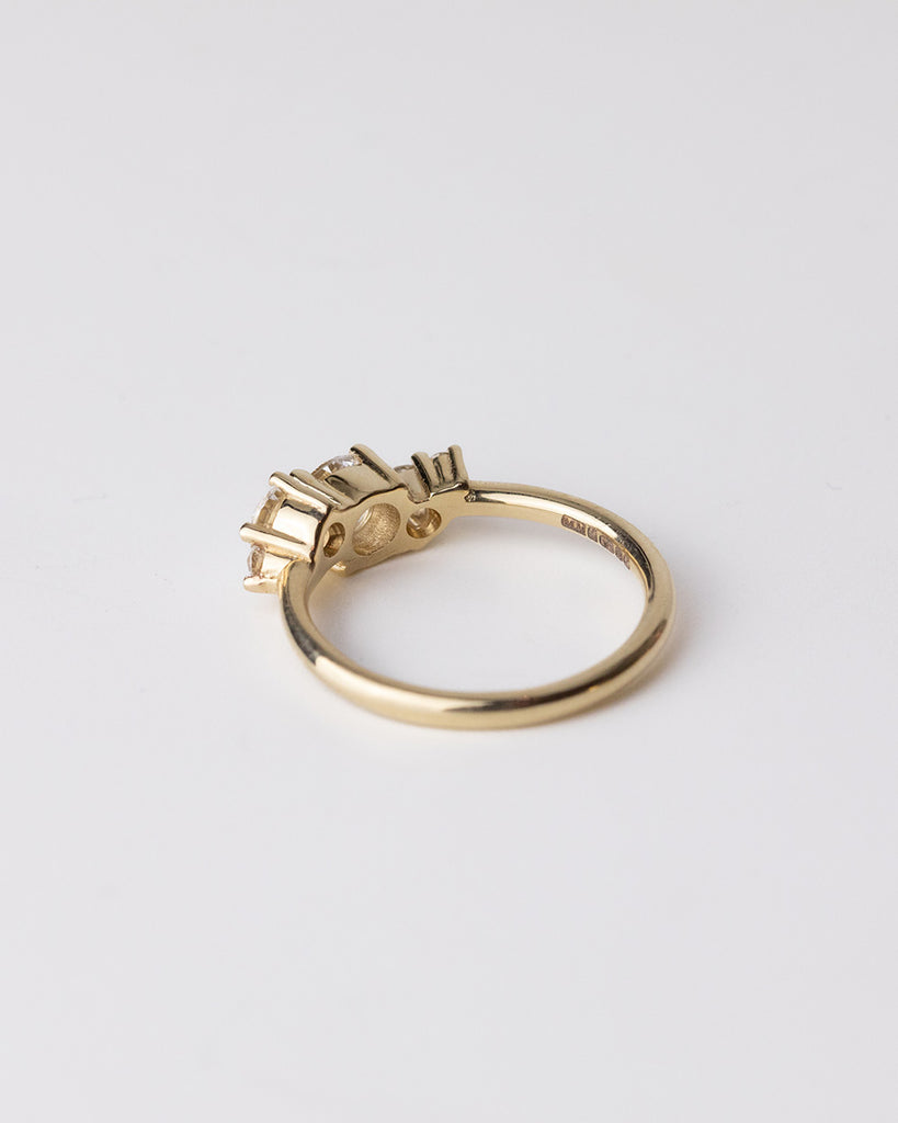 Cluster ring with lab grown white diamonds set in a recycled 9 ct solid yellow gold band handcrafted in London by Maya Magal