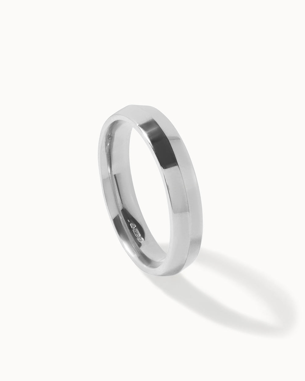 Platinum Fine Edge Ring - 4mm Band side view white background