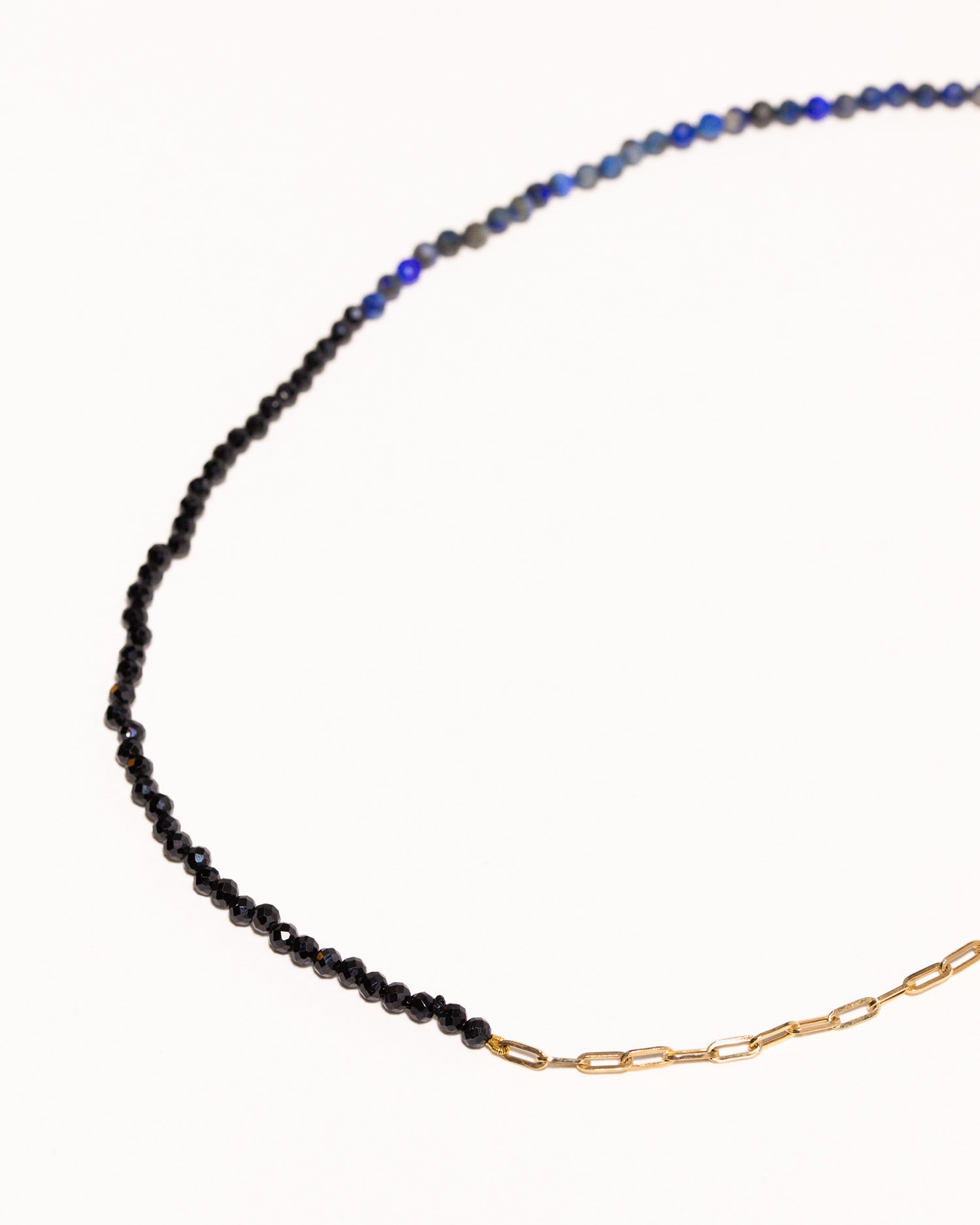 Blue lapis and black spinnel beaded necklace handstrung on silk thread handcrafted in London with 9ct solid gold by Maya Magal London