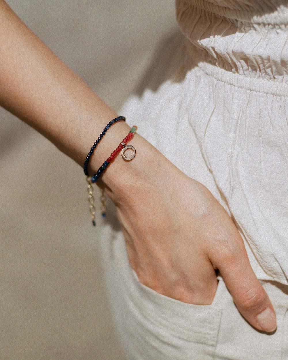 Blue sapphire beaded bracelet handstrung on silk thread handcrafted in London with 9ct solid gold by Maya Magal London