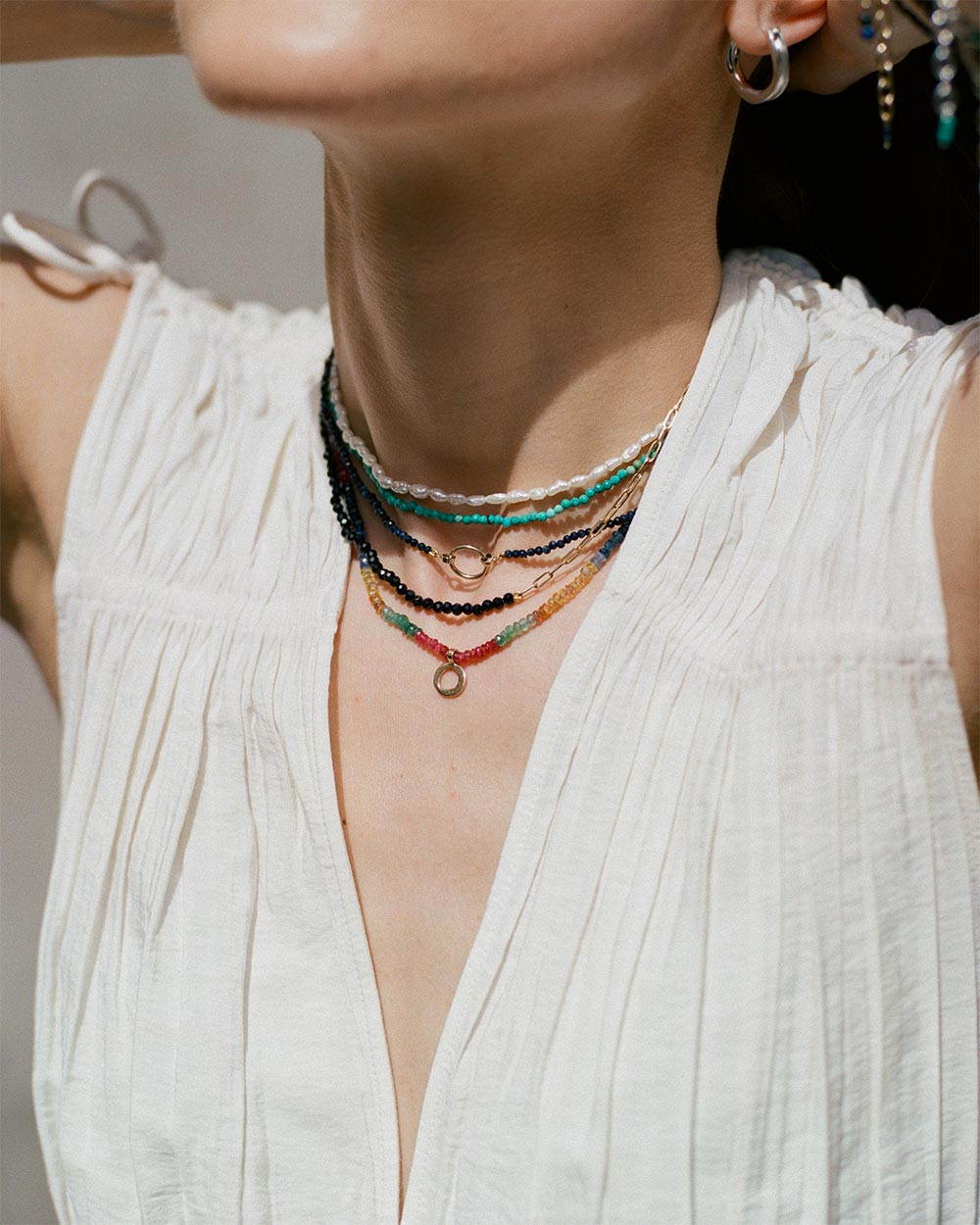 Blue lapis and black spinnel beaded necklace handstrung on silk thread handcrafted in London with 9ct solid gold by Maya Magal London