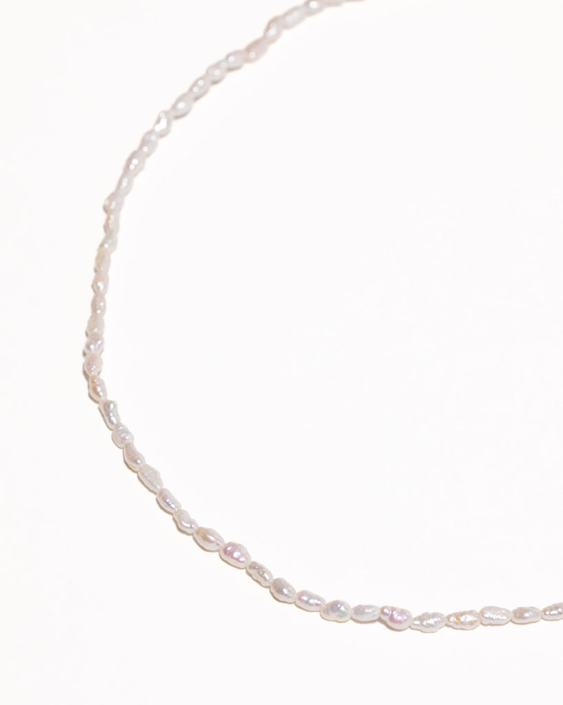 rice pearls beaded necklace handstrung on silk thread handcrafted in London with 925 sterling silver by Maya Magal London