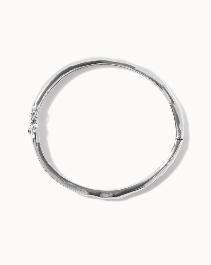 Recycled 925 sterling silver molten hinged bangle handcrafted in London by Maya Magal London