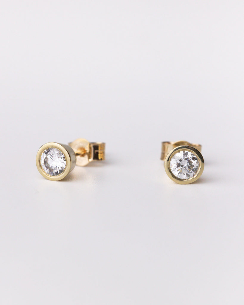 0.25ct lab grown white brilliant cut diamond stud earrings set in 9ct solid yellow gold Handcrafted in London by Maya Magal London