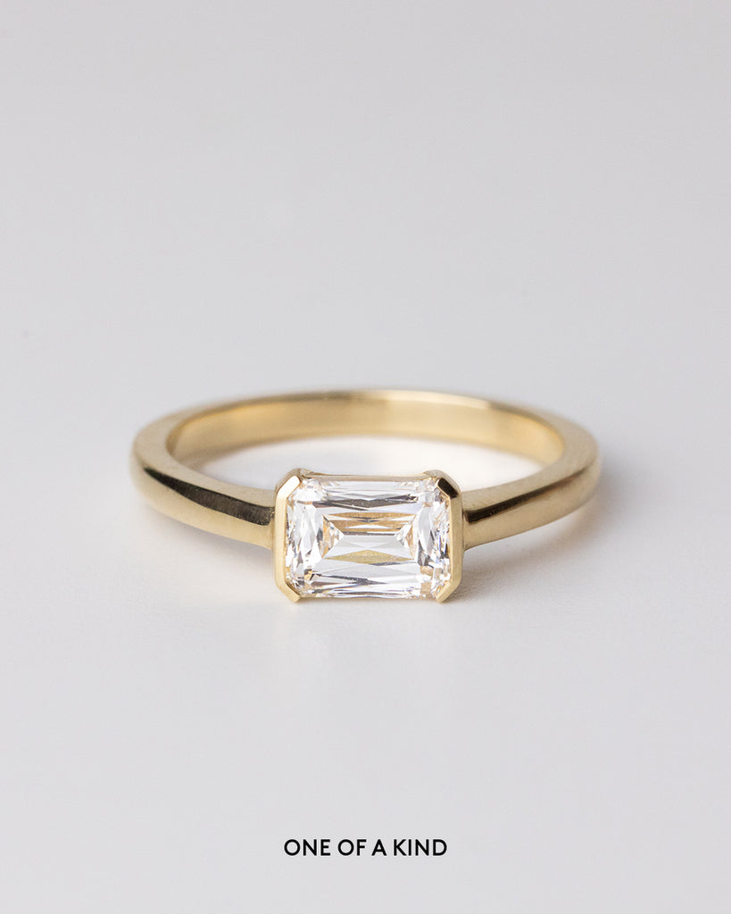 Scissor cut lab grown white diamond solitaire ring set in a recycled 9 ct solid yellow gold band handcrafted in London by Maya Magal