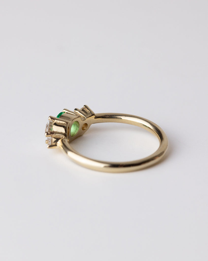 Ethiopian emerald cluster ring with lab grown white diamonds set in a recycled 9 ct solid yellow gold band handcrafted in London by Maya Magal
