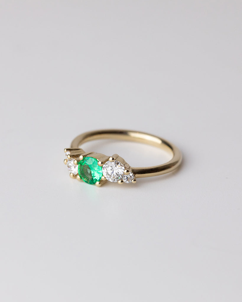 Ethiopian emerald cluster ring with lab grown white diamonds set in a recycled 9 ct solid yellow gold band handcrafted in London by Maya Magal