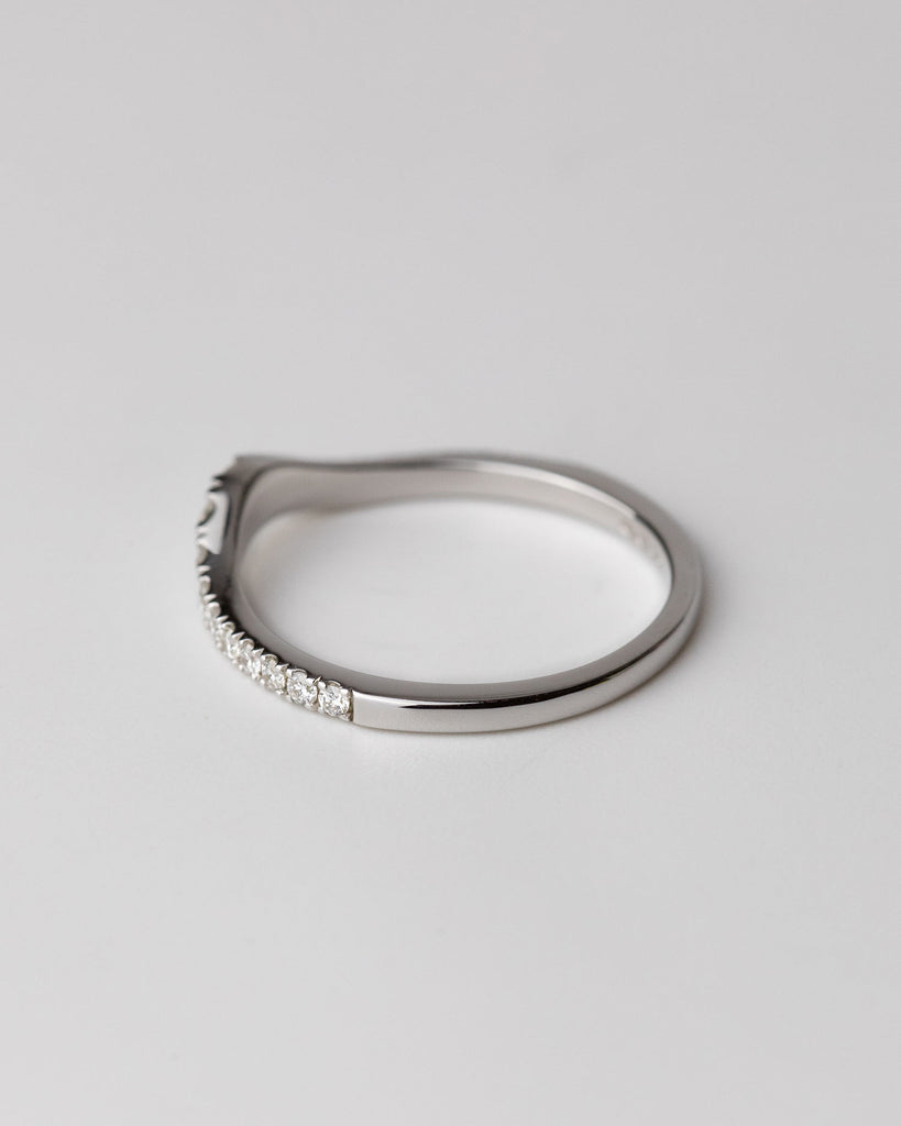 recycled 9ct solid white gold wishbone wedding band with pavé set diamonds crafted with sloping U shape in London by Maya Magal