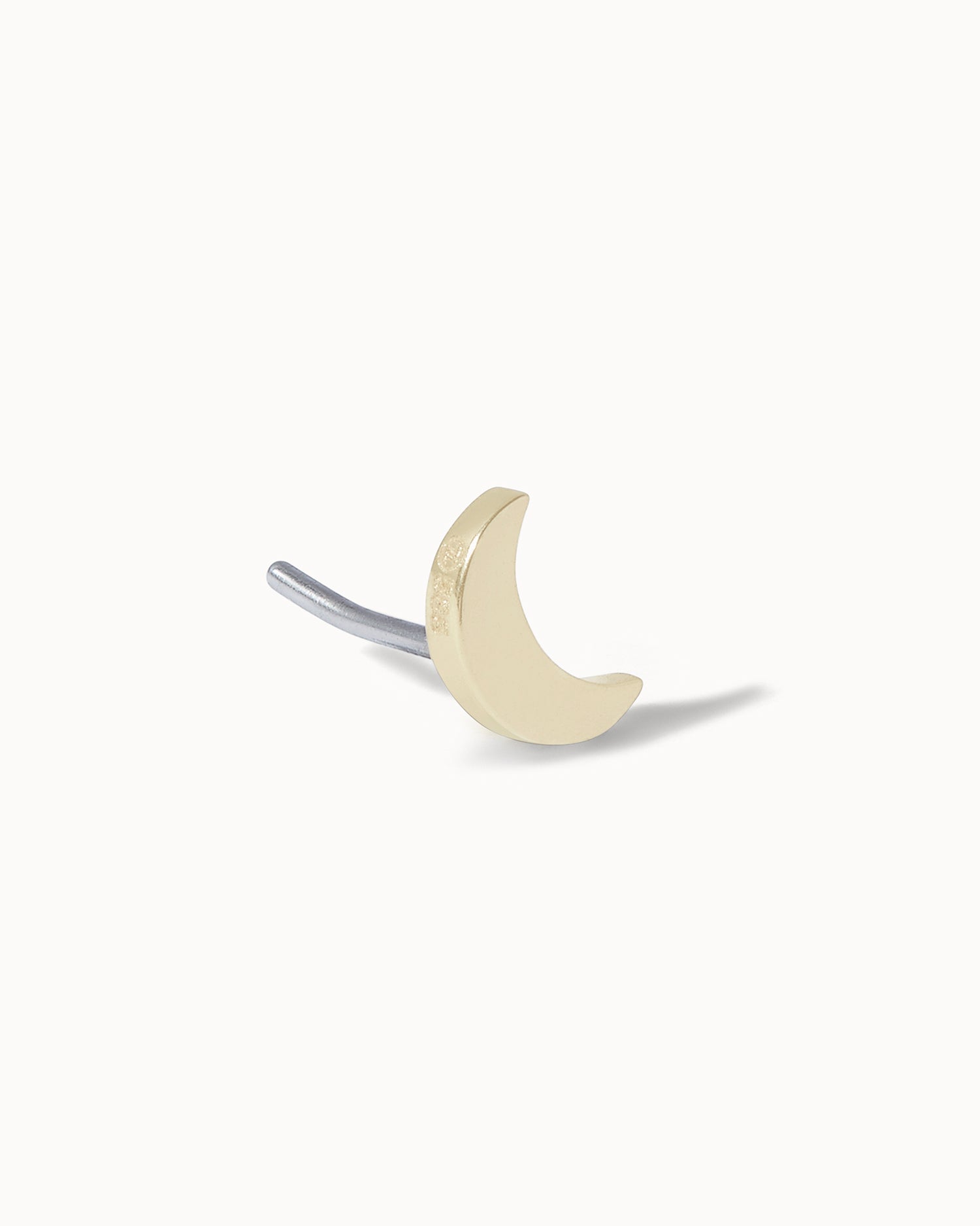 front/side view of crescent moon threadless earring stud.