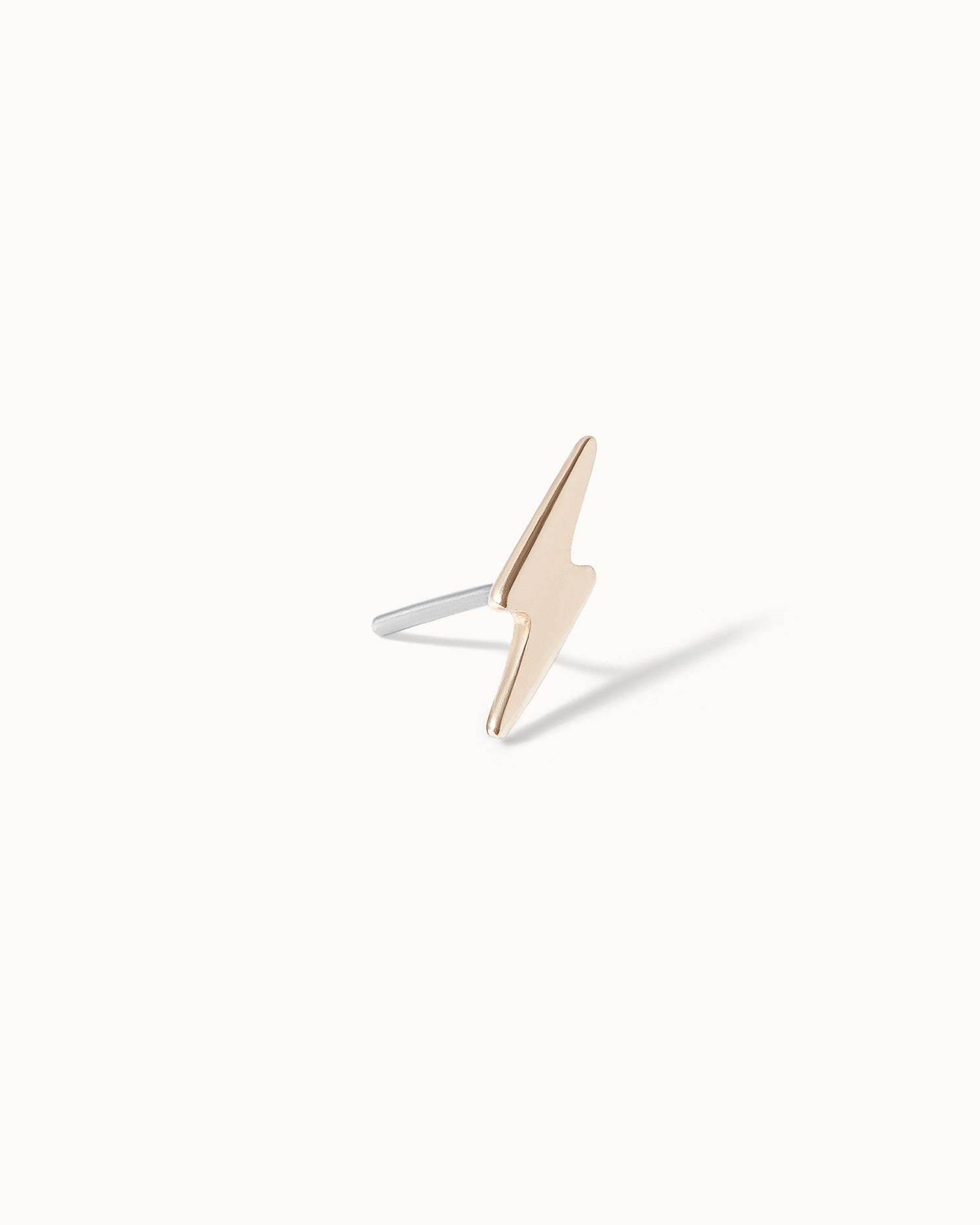 Side view of Flat back lightning bold solid 14ct gold stud earring.