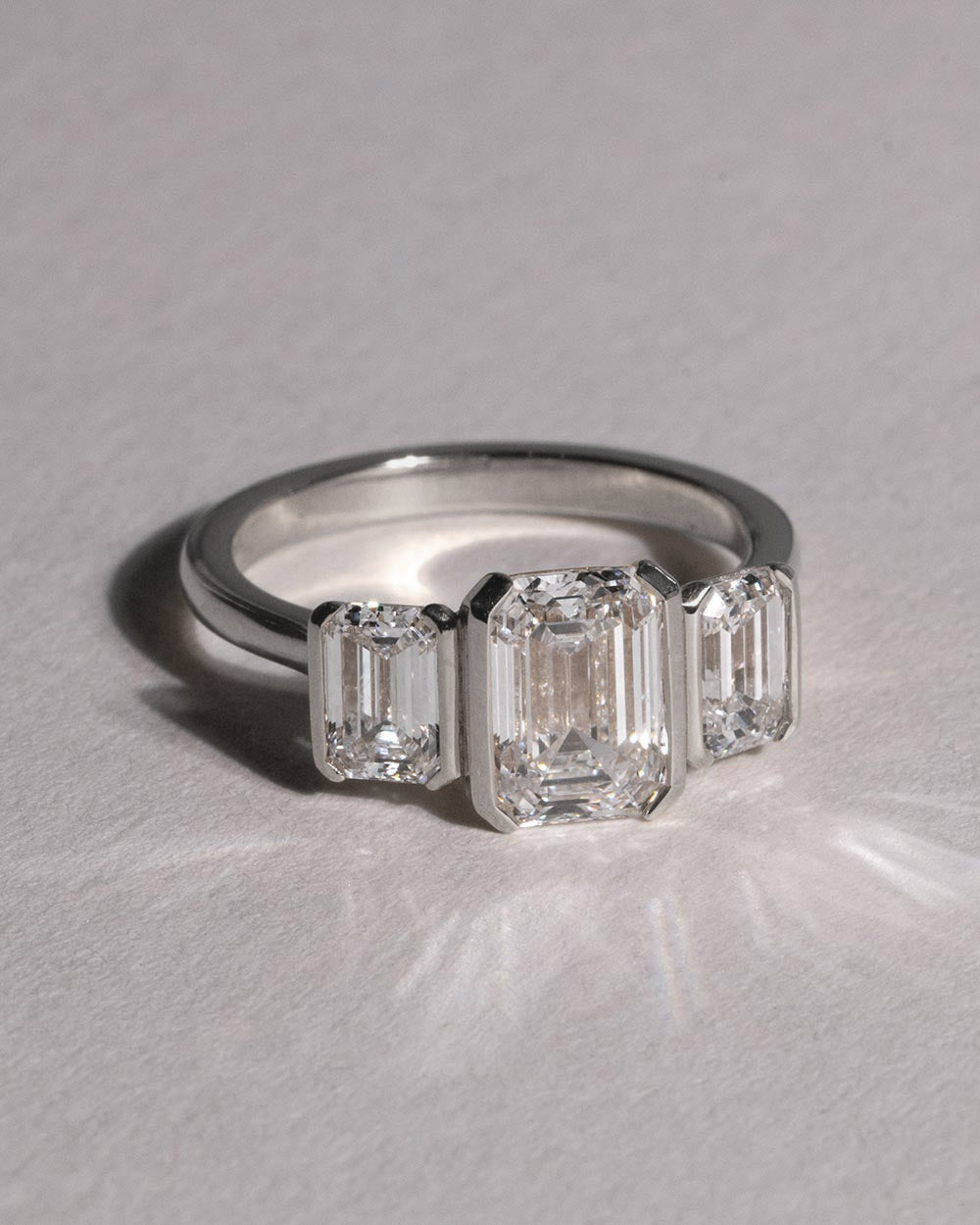 Platinum Emerald Cut Lab Grown Diamond Trilogy Ring